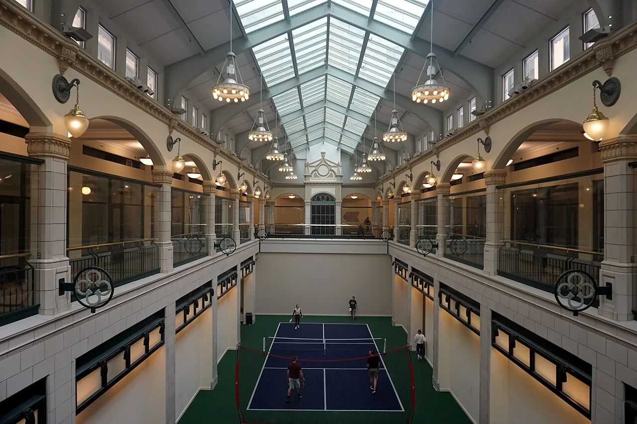 Rows of dedicated pickleball courts at a large outdoor complex