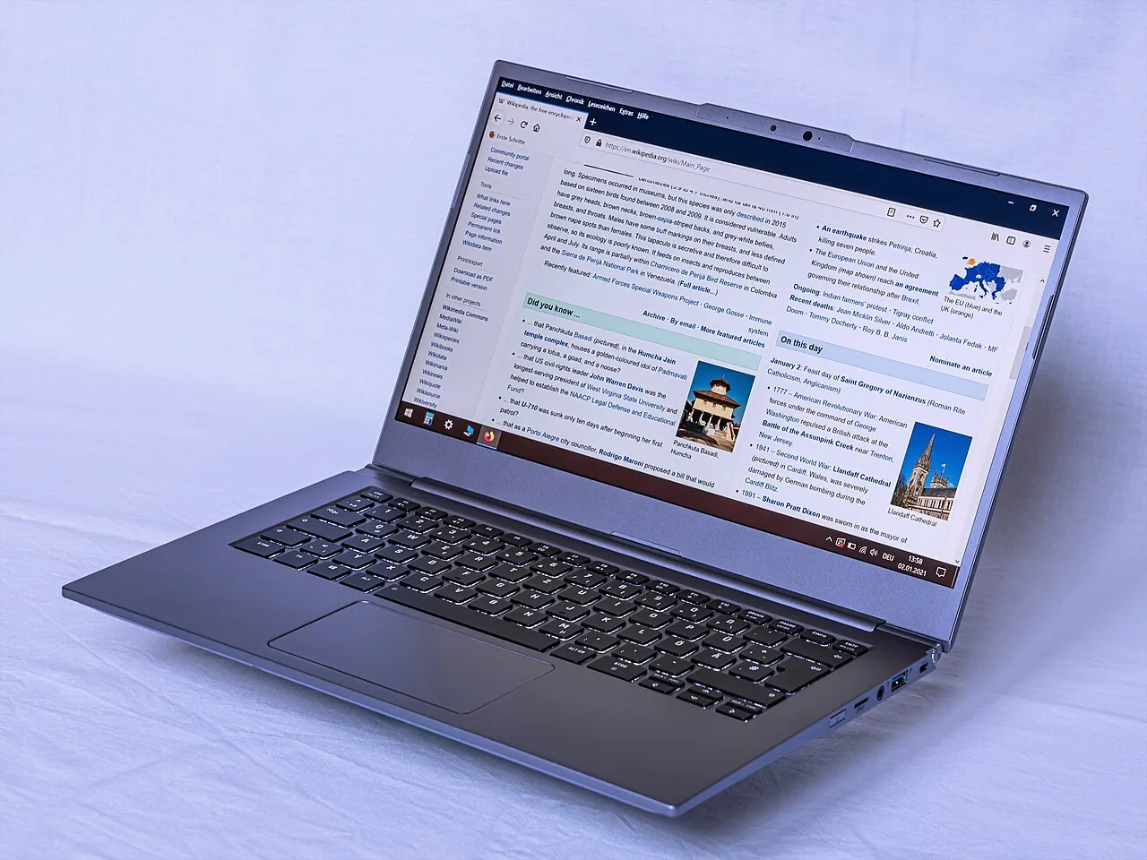 A person comparing options on a laptop screen