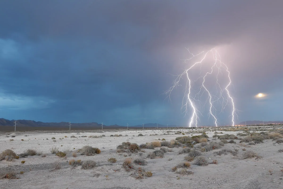 Lightning striking over the Arizona desert at dusk