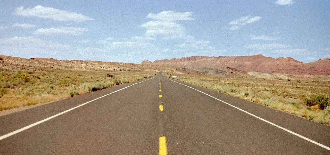 Open high-desert highway heading north toward Page, Arizona