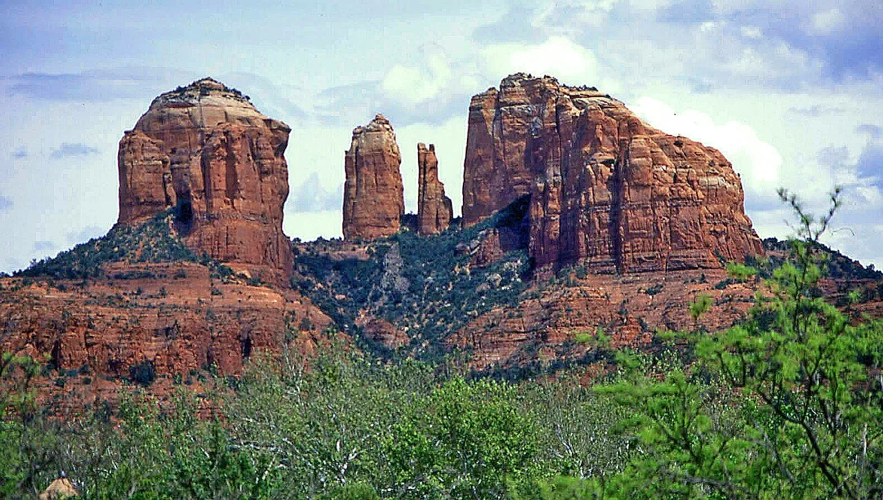Oak Creek flowing through a green, tree-lined canyon near Sedona