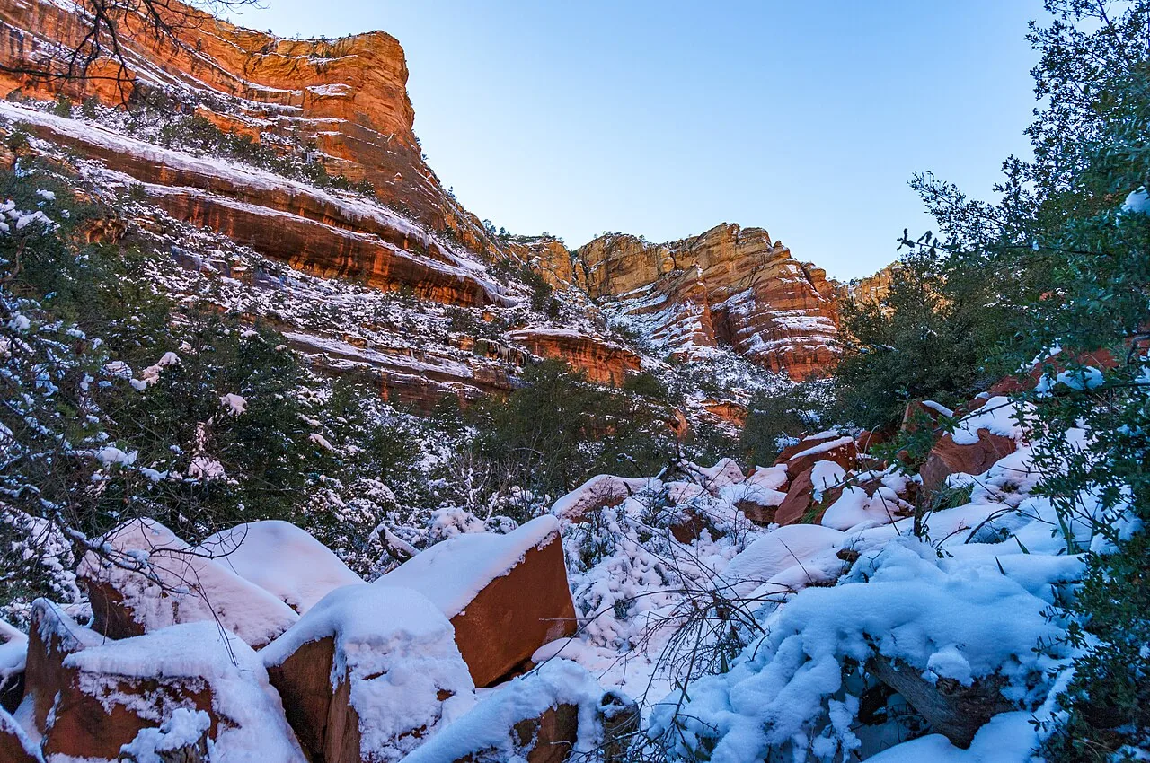 The natural sandstone Fay Canyon Arch set into the red cliff face near Sedona