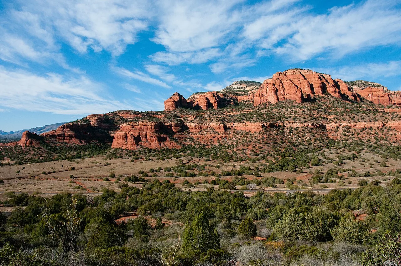 Tilted red rock slabs and unshaded slopes on the Bear Mountain trail near Sedona