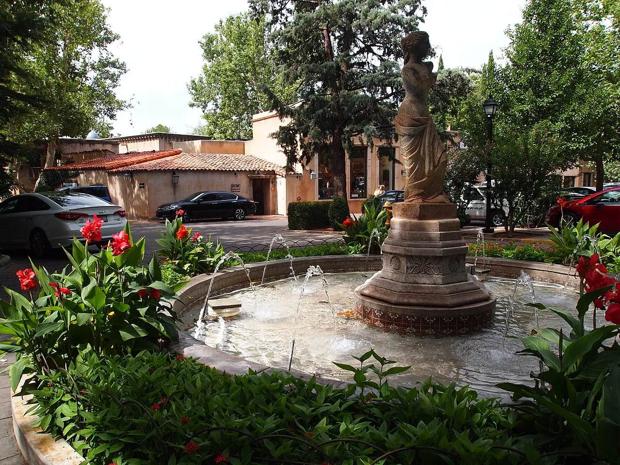 Cobbled walkway and stucco arches inside the Tlaquepaque arts village in Sedona
