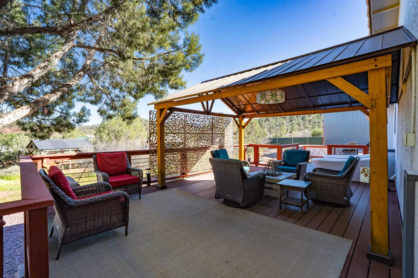 The home's deck and desert surroundings