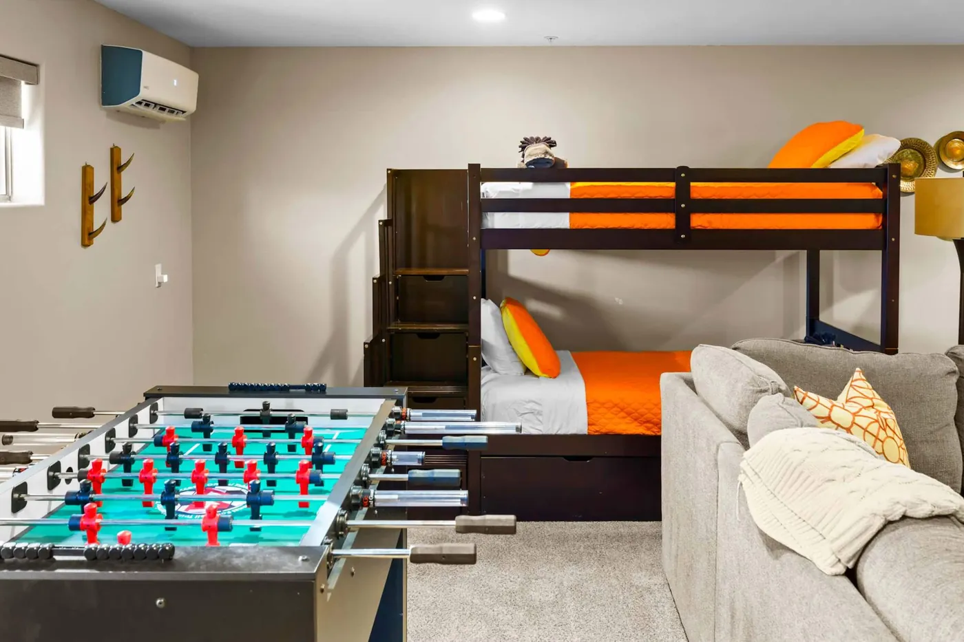 Bunk beds and foosball in the game room