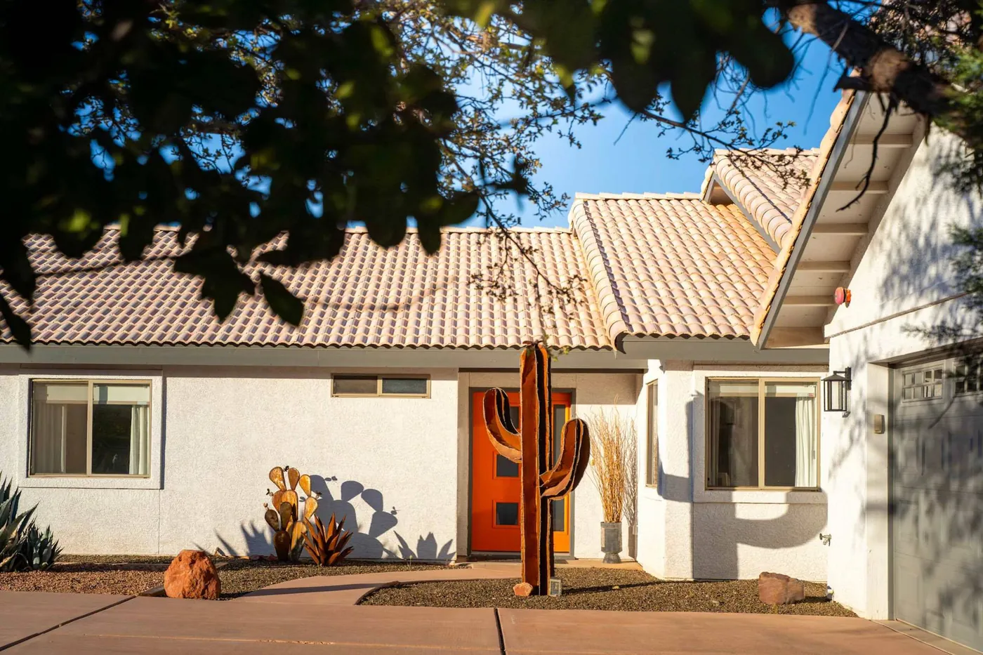 Front entrance of the home with its orange door